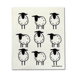 A white dishcloth with a pattern of black sheep bouncing up and down.