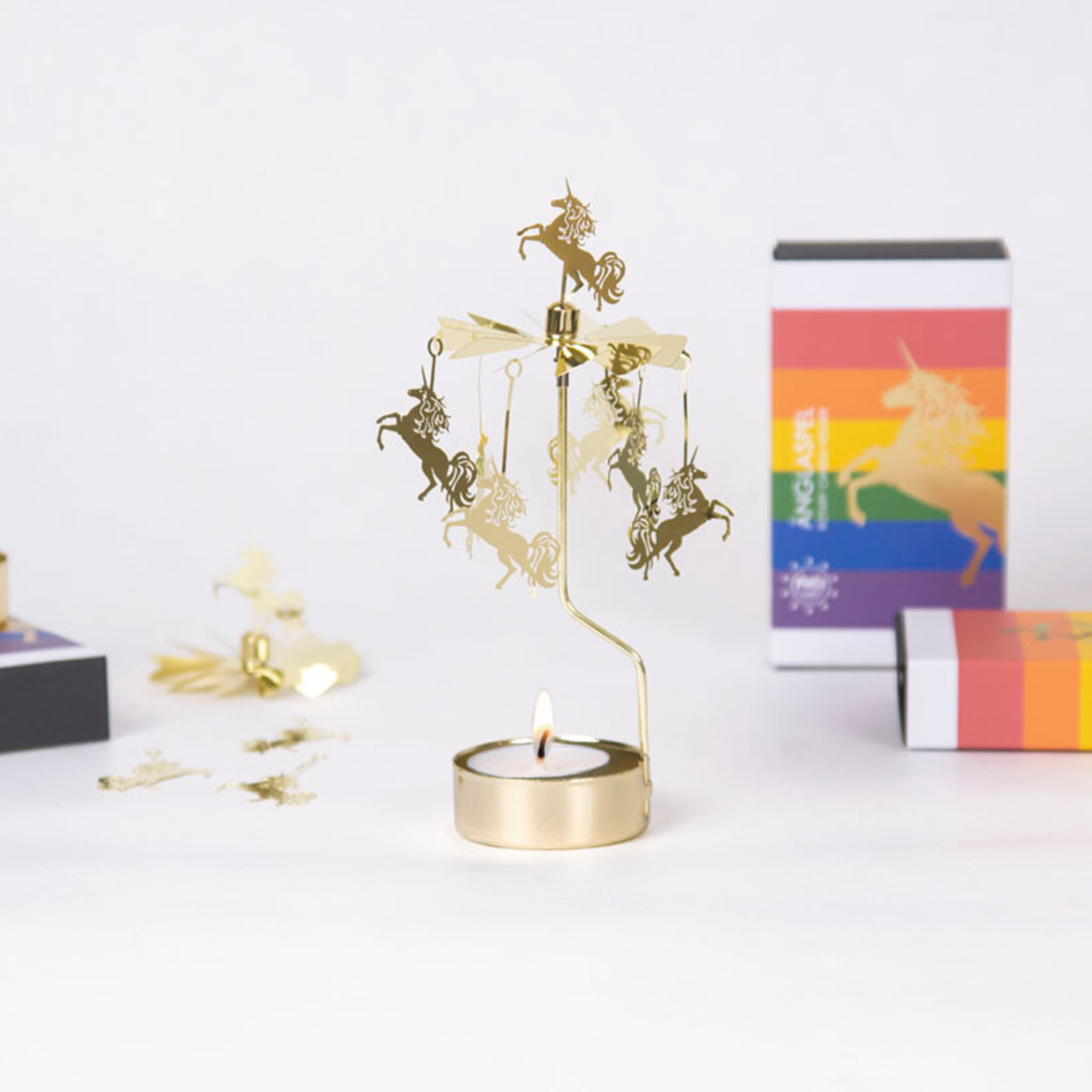 candle carousel unicorn gold by pluto design sweden