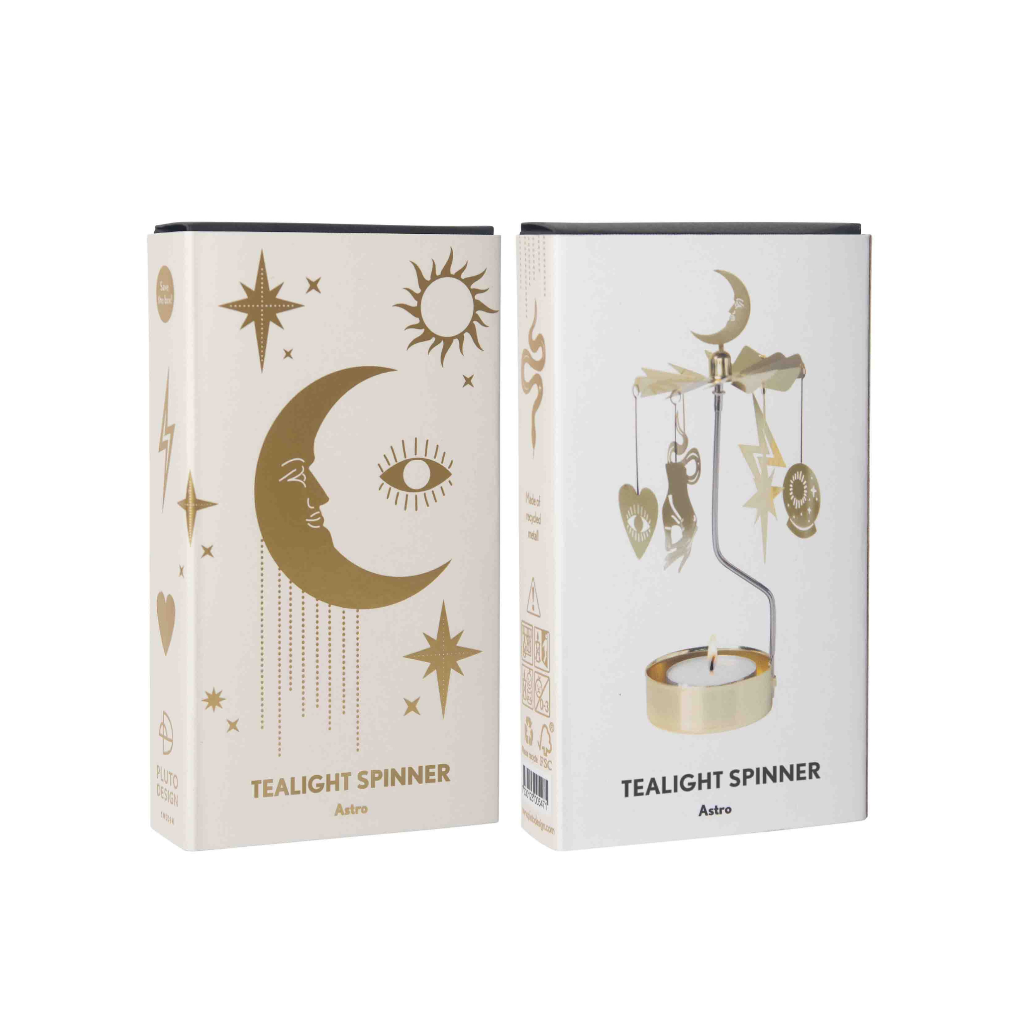 Two boxes of a tealight spinner with astrological designs on a white background