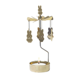 Decorative candle holder with Miffy rabbit figures on a white background
