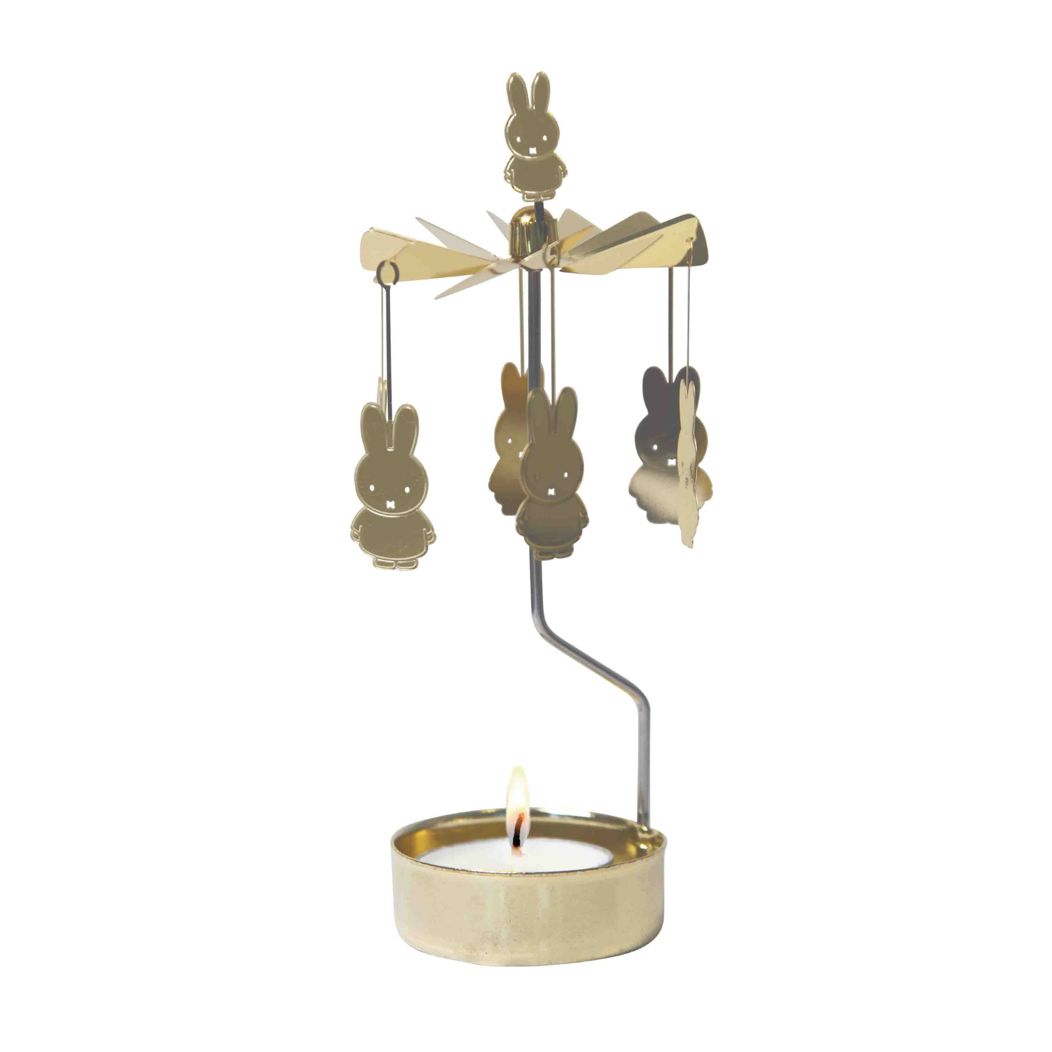 Decorative candle holder with Miffy rabbit figures on a white background