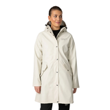 Woman wearing a white coat on a white background